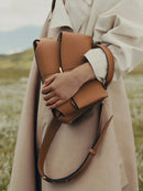 1pcs High end luxury leather smile bag with pleated design, single shoulder large capacity commuting handbag